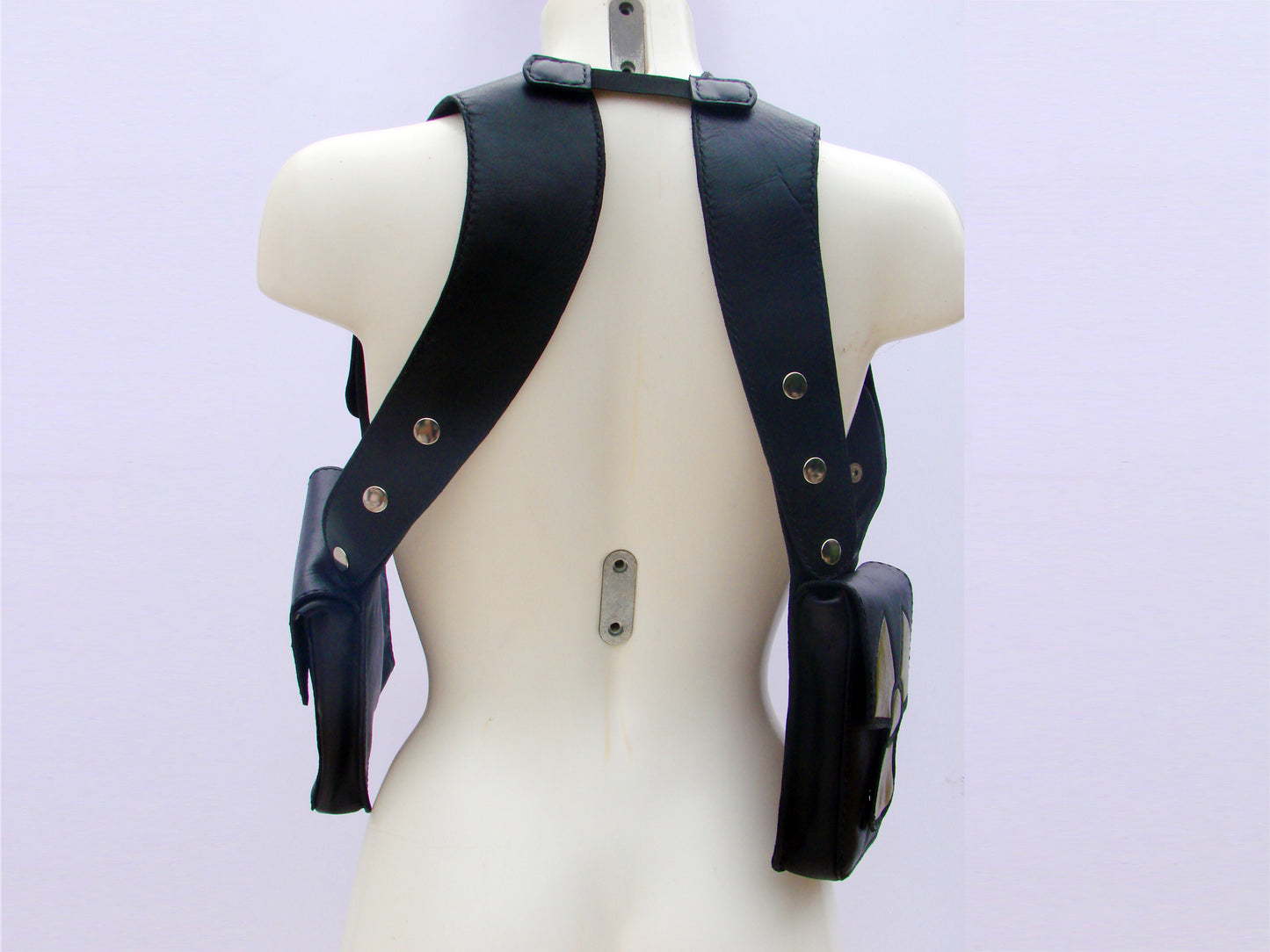Rock & Rave in style with our leather double shoulder holster bag hand tooled radioactive symbol