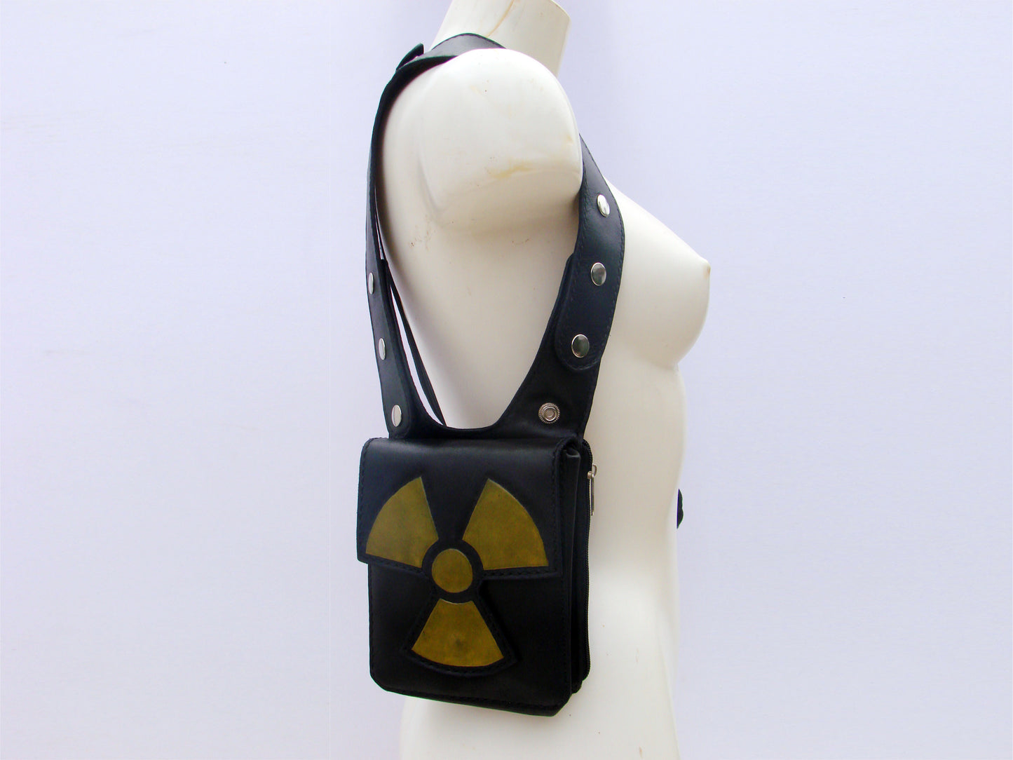 Rock & Rave in style with our leather double shoulder holster bag hand tooled radioactive symbol