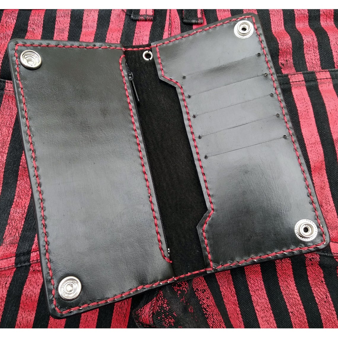Biker-style wallet with engraved devil and flags by Another Way of Life